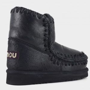 Black warm ankle boots by Mou